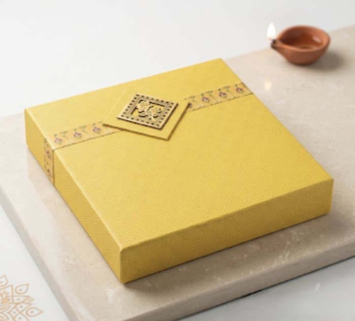 Yellow textured gift box with emblem