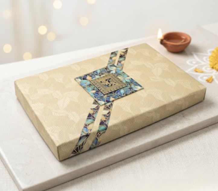 Leaf embossed box with blue mosaic band